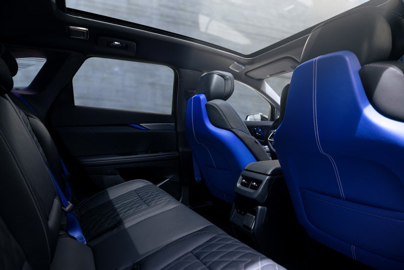Back Seat View of the 2026 OPTIQ-V Blue Front Seats, Sun Roof, and Interior | Horne Auto Center Inc in Show Low AZ